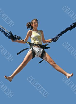 Girl bungee jumping