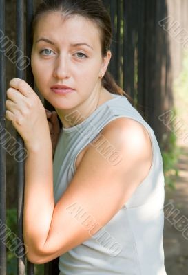 woman near a fence