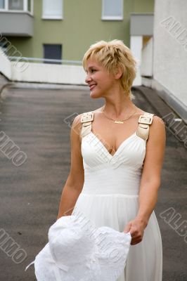 blond woman in a white dress
