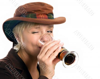 woman drinking dark beer