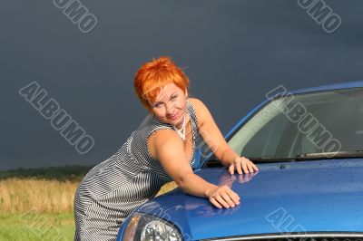 young sexy woman and a car