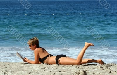 Woman relaxing on a beach