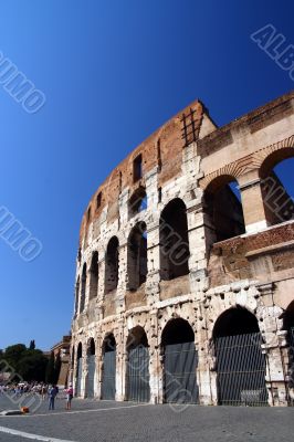roman colosseum against blue sky