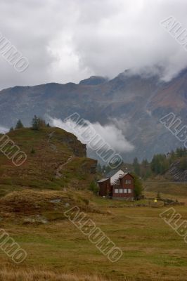 Small house in mountains.