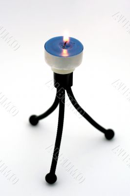 candle on a tripod