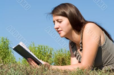 girl reads book