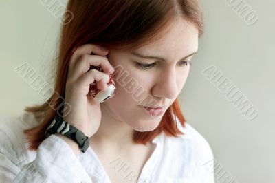 Redhead girl on the phone