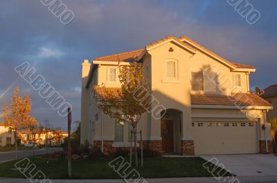 house lit by evening sun