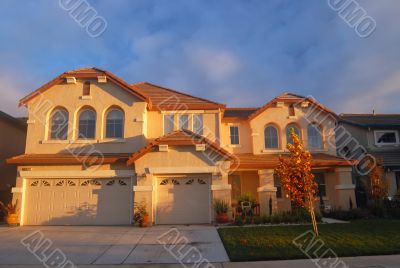house lit by evening sun