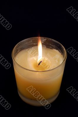 Candle Against Black Background