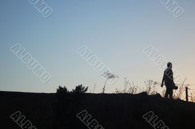 Silhouette of a fisherman
