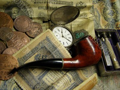money, clock and pipe