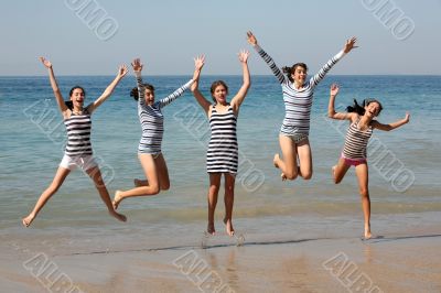 Five girls jumping