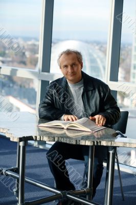 Mature man in the library