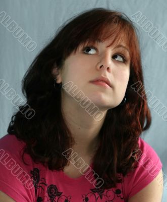 Teenage girl looking up