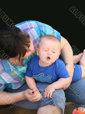 Mother playing with her baby