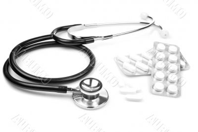 Stethoscope and pills