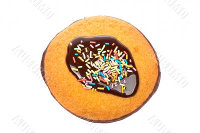 Cake with chocolate syrup and sweets