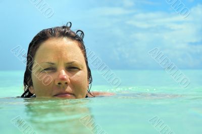 woman swimming in open ocean