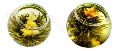 Two bowls of green tea with chrysanthemums