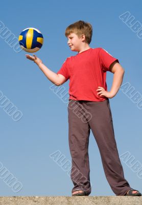 boy throws ball