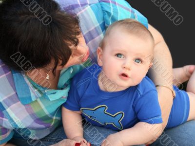 Mother playing with her baby