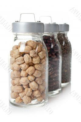 Glass jars of chickpeas, red beans and lentils