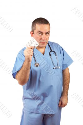 Doctor holding a pills