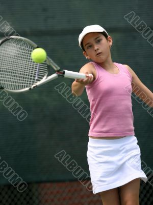 Girl playing tennis