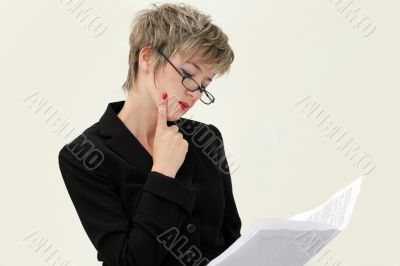 Businesswoman reading a paper