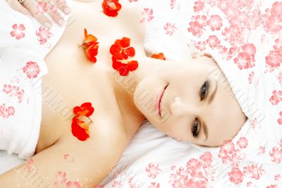red flower petals spa with flowers