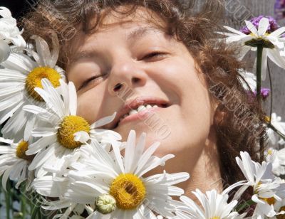 Smiling Woman With Daisies