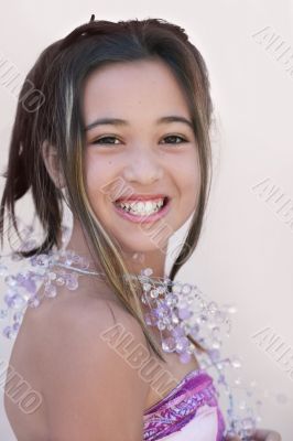 happy asian girl with a necklace