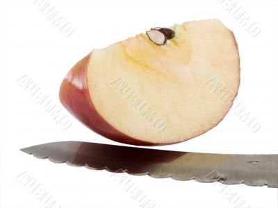 Fugi Apple wedge and a knife
