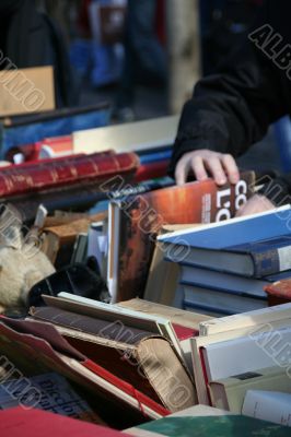 Piles of old books for sale