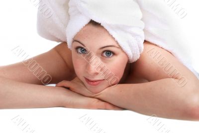 Laying girl in towel
