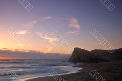 sunset by the ocean