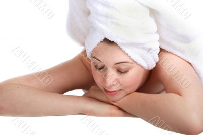 Laying girl in towel
