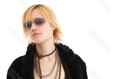 Blonde woman in furry coat and sunglasses