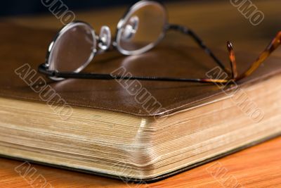 Glasses on Bible