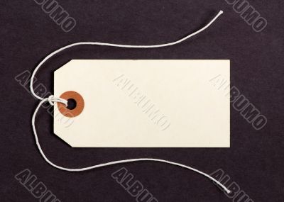 Tag on brown background 2
