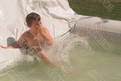 Boy on a Waterslide