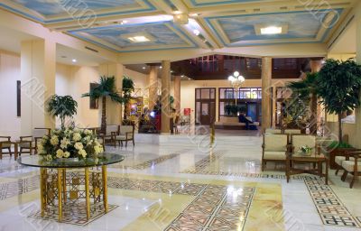 Hall in hotel with marble floor