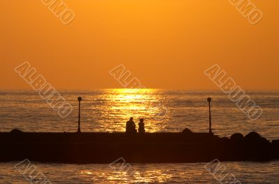romantic couple on a pier