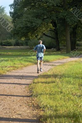 Mature healthy man jogging