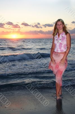 Beautiful blonde in sunrise lights