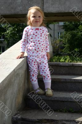 Pretty baby girl in sunny day