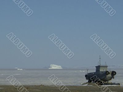iceberg and a boat