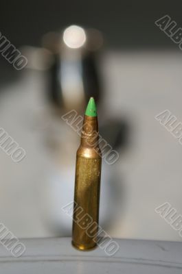 A bullet on a table