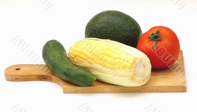 Vegetables on a wooden plate